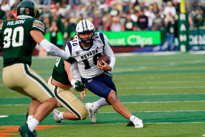 Nov 18, 2023; Fort Collins, Colorado, USA;  Nevada Wolf Pack quarterback AJ Bianco (10) scrambles out of the pocket in the1 at Sonny Lubick Field at Canvas Stadium. Mandatory Credit: Michael Madrid-USA TODAY Sports