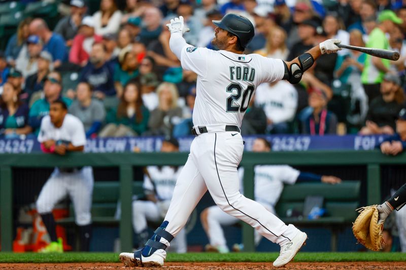 Jun 13, 2023; Seattle, Washington, USA; Seattle Mariners designated hitter Mike Ford (20) hits a two-run home run against the Miami Marlins during the fourth inning at T-Mobile Park. Mandatory Credit: Joe Nicholson-USA TODAY Sports