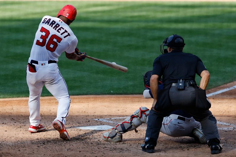 Aug 17, 2023; Washington, District of Columbia, USA; Washington Nationals left fielder Stone Garrett (36) hits an RBI double against the Boston Red Sox during the fifth inning at Nationals Park. Mandatory Credit: Geoff Burke-USA TODAY Sports