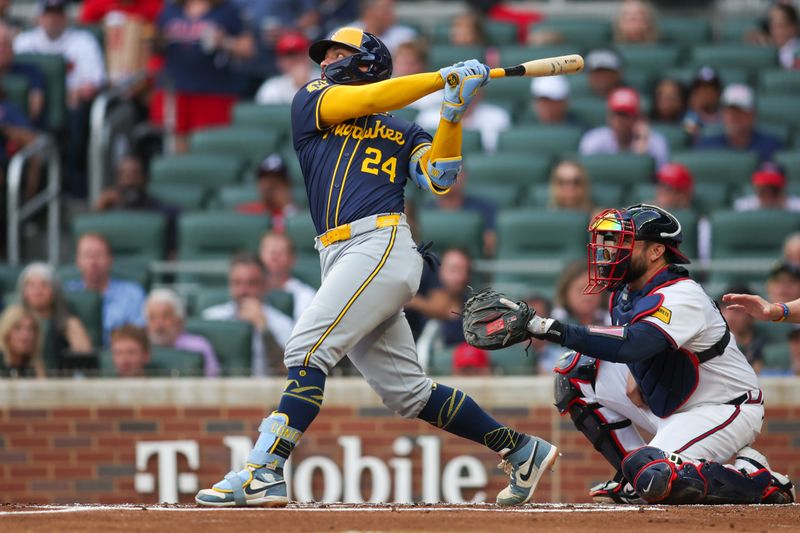 Aug 6, 2024; Atlanta, Georgia, USA; Milwaukee Brewers catcher William Contreras (24) hits a triple against the Atlanta Braves in the first inning at Truist Park. Mandatory Credit: Brett Davis-USA TODAY Sports