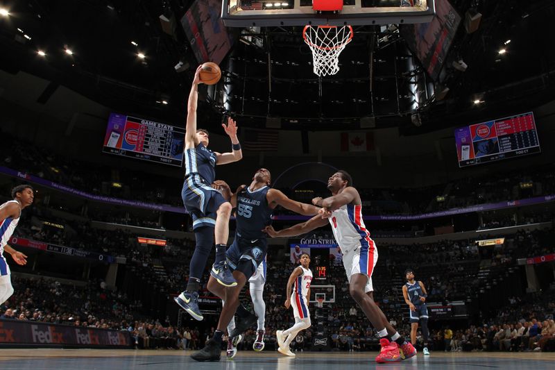 MEMPHIS, TN - APRIL 5: Jake LaRavia #3 of the Memphis Grizzlies drives to the basket during the game against the Detroit Pistons on April 5, 2024 at FedExForum in Memphis, Tennessee. NOTE TO USER: User expressly acknowledges and agrees that, by downloading and or using this photograph, User is consenting to the terms and conditions of the Getty Images License Agreement. Mandatory Copyright Notice: Copyright 2024 NBAE (Photo by Joe Murphy/NBAE via Getty Images)