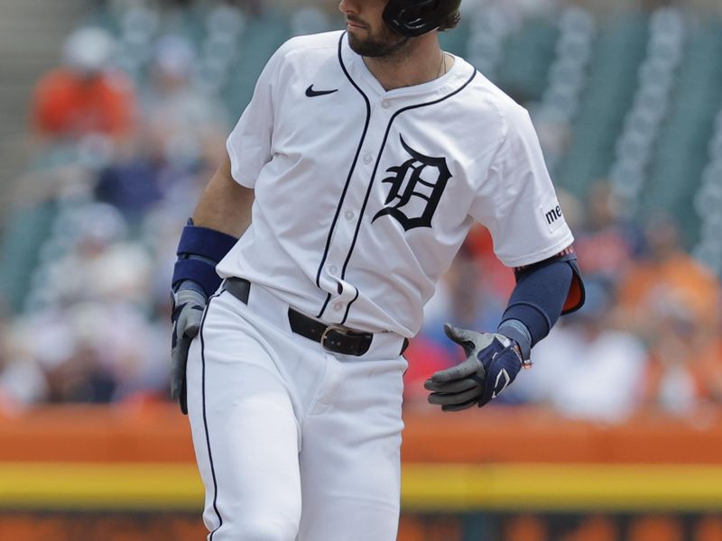Jul 11, 2024; Detroit, Michigan, USA;  Detroit Tigers shortstop Zach McKinstry (39) celebrates after he hits a double in the fourth inning against the Cleveland Guardians at Comerica Park. Mandatory Credit: Rick Osentoski-USA TODAY Sports