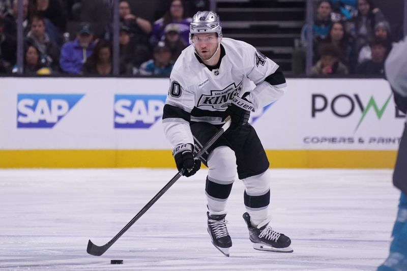 Nov 20, 2025; San Jose, California, USA;  Los Angeles Kings right winger Joel Armia (40) advances the puck against the San Jose Sharks in the second period at SAP Center at San Jose. Mandatory Credit: David Gonzales-Imagn Images