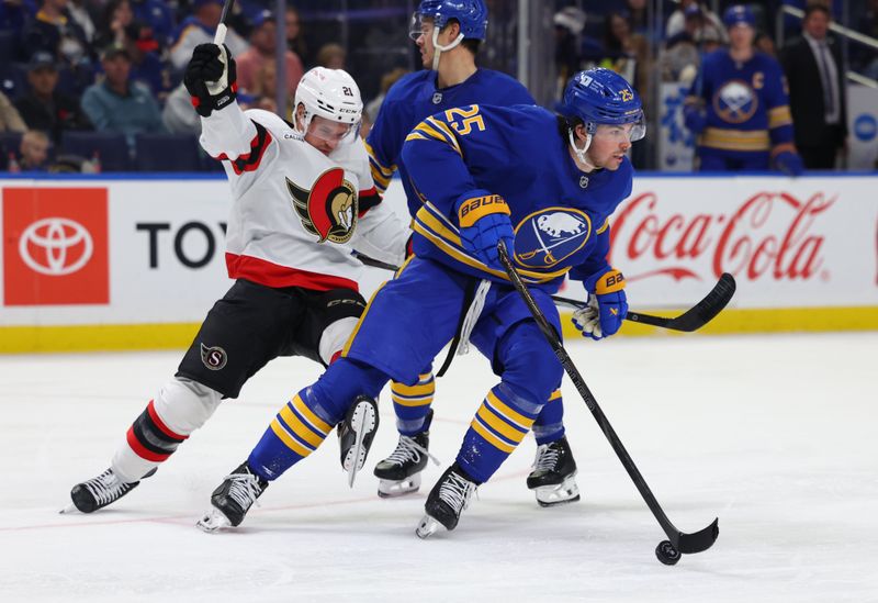 Nov 5, 2024; Buffalo, New York, USA;  Buffalo Sabres defenseman Owen Power (25) skates with the puck as Ottawa Senators center Nick Cousins (21) tries to defend during the third period at KeyBank Center. Mandatory Credit: Timothy T. Ludwig-Imagn Images