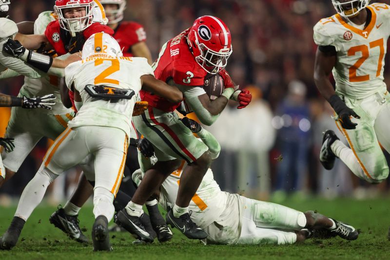 Nov 16, 2024; Athens, Georgia, USA; Georgia Bulldogs running back Nate Frazier (3) runs the ball against the Tennessee Volunteers in the fourth quarter at Sanford Stadium. Mandatory Credit: Brett Davis-Imagn Images
