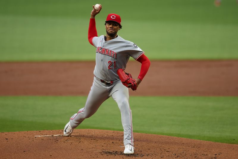 May 7, 2025; Atlanta, Georgia, USA; Cincinnati Reds starting pitcher Hunter Greene (21) throws against the Atlanta Braves in the first inning at Truist Park. Mandatory Credit: Brett Davis-Imagn Images