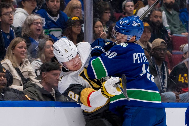 Apr 8, 2024; Vancouver, British Columbia, CAN; Vancouver Canucks forward Elias Pettersson (40) checks Vegas Golden Knights defenseman Zach Whitecloud (2) in the first period  at Rogers Arena. Mandatory Credit: Bob Frid-USA TODAY Sports