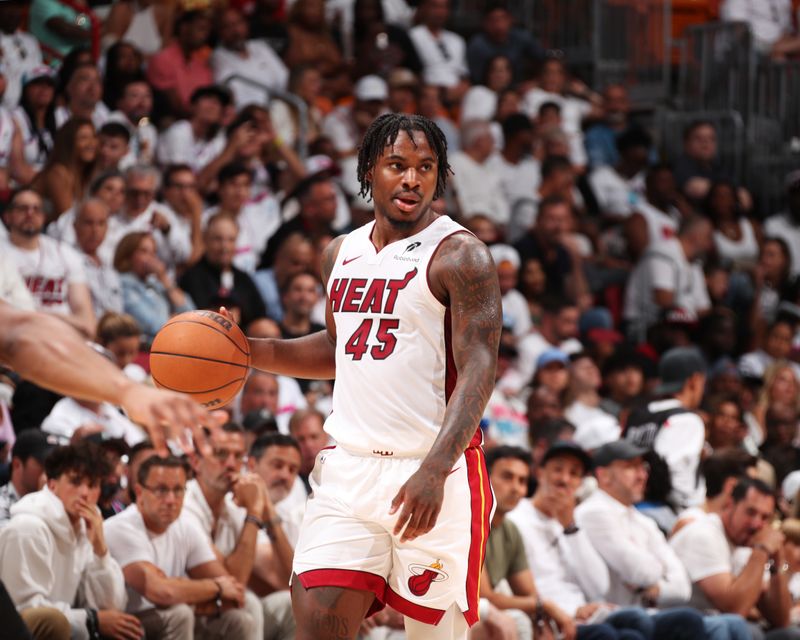 MIAMI, FL - APRIL 26: Davion Mitchell #45 of the Miami Heat dribbles the ball during the game against the Cleveland Cavaliers during Round 1 Game 3 of the 2025 NBA Playoffs on April 26, 2025 at Kaseya Center in Miami, Florida. NOTE TO USER: User expressly acknowledges and agrees that, by downloading and or using this Photograph, user is consenting to the terms and conditions of the Getty Images License Agreement. Mandatory Copyright Notice: Copyright 2025 NBAE (Photo by Issac Baldizon/NBAE via Getty Images)