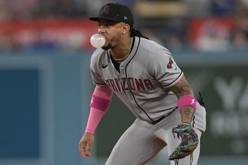 May 21, 2025; Los Angeles, California, USA; Arizona Diamondbacks second baseman Ketel Marte (4) gets set in the fifth inning against the Los Angeles Dodgers at Dodger Stadium. Mandatory Credit: Jayne Kamin-Oncea-Imagn Images