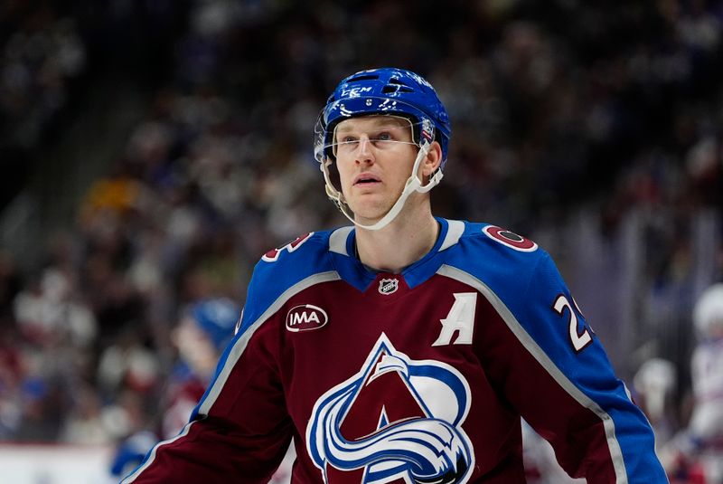 Jan 14, 2025; Denver, Colorado, USA; Colorado Avalanche center Nathan MacKinnon (29) during the second period against the New York Rangers at Ball Arena. Mandatory Credit: Ron Chenoy-Imagn Images