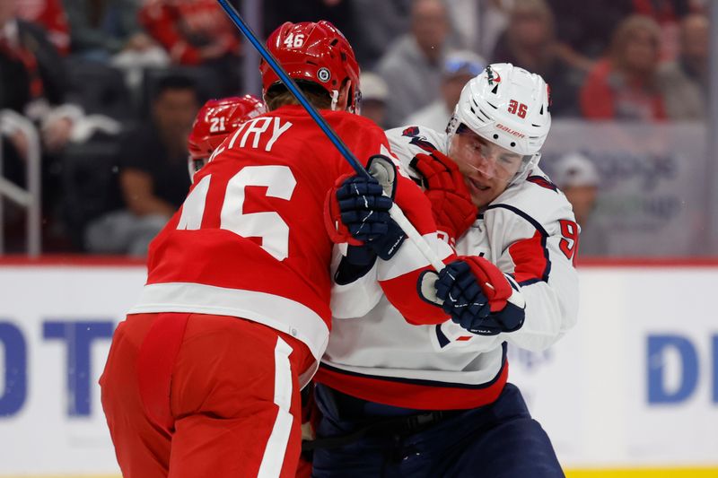 Apr 9, 2024; Detroit, Michigan, USA; Detroit Red Wings defenseman Jeff Petry (46) checks Washington Capitals right wing Nicolas Aube-Kubel (96)ref10 in the first period at Little Caesars Arena. Mandatory Credit: Rick Osentoski-USA TODAY Sports