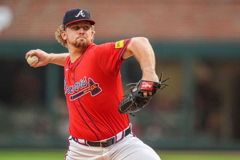 Aug 2, 2024; Cumberland, Georgia, USA; Atlanta Braves starting pitcher Spencer Schwellenbach (56) pitches against the Miami Marlins during the first inning at Truist Park. Mandatory Credit: Dale Zanine-USA TODAY Sports