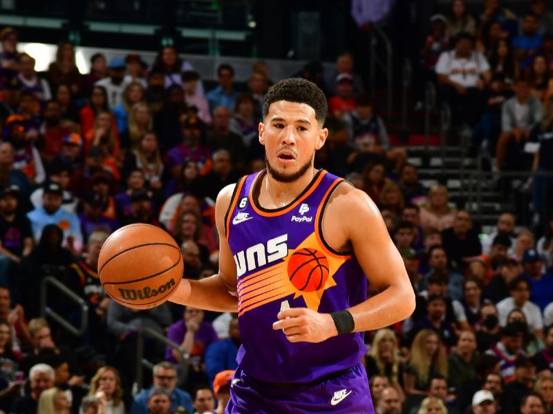 PHOENIX, AZ - OCTOBER 25 Devin Booker #1 of the Phoenix Suns handles  the ball during the game during the game against the Golden State Warriors on October 25 2022 at Footprint Center in Phoenix, Arizona. NOTE TO USER: User expressly acknowledges and agrees that, by downloading and or using this photograph, user is consenting to the terms and conditions of the Getty Images License Agreement. Mandatory Copyright Notice: Copyright 2022 NBAE (Photo by Kate Frese/NBAE via Getty Images)