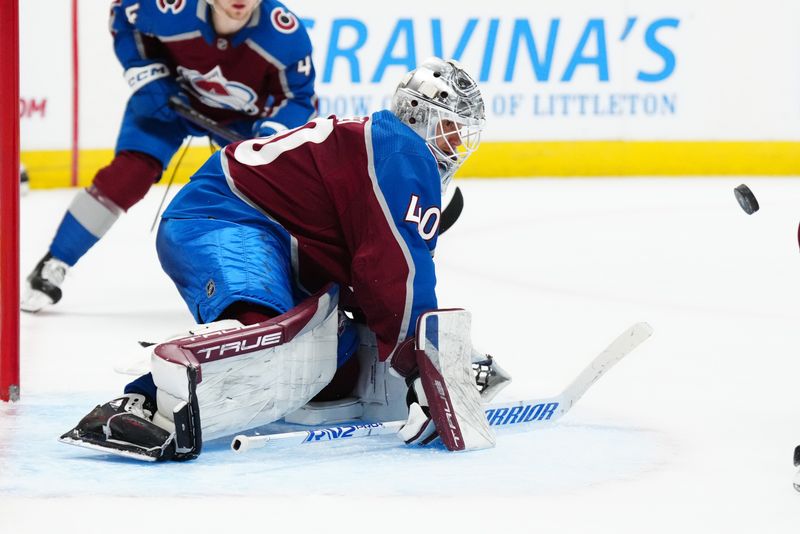 Nov 27, 2023; Denver, Colorado, USA; Colorado Avalanche goaltender Alexandar Georgiev (40) tracks the puck in the third period against the Tampa Bay Lightning at Ball Arena. Mandatory Credit: Ron Chenoy-USA TODAY Sports