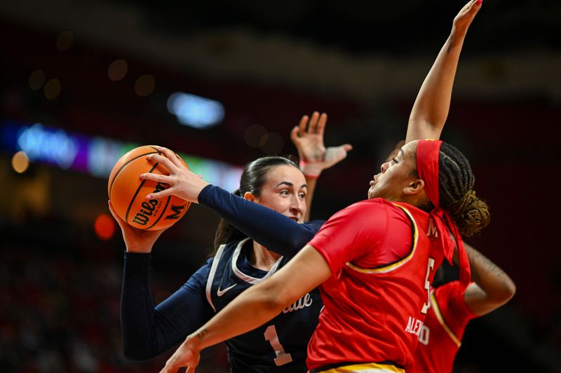 Feb 18, 2024; College Park, Maryland, USA;  Penn State Nittany Lions forward Ali Brigham (1) looks to pass as Maryland Terrapins guard Brinae Alexander (5) closes to defend during the first half at Xfinity Center. Mandatory Credit: Tommy Gilligan-USA TODAY Sports