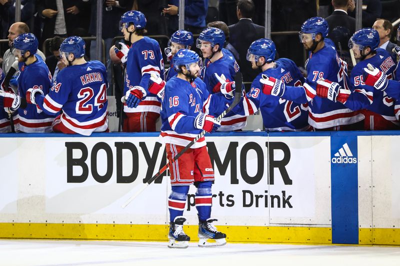 May 5, 2024; New York, New York, USA; New York Rangers center Vincent Trocheck (16) celebrates with his teammates after scoring a goal in the first period against the Carolina Hurricanes in game one of the second round of the 2024 Stanley Cup Playoffs at Madison Square Garden. Mandatory Credit: Wendell Cruz-USA TODAY Sports