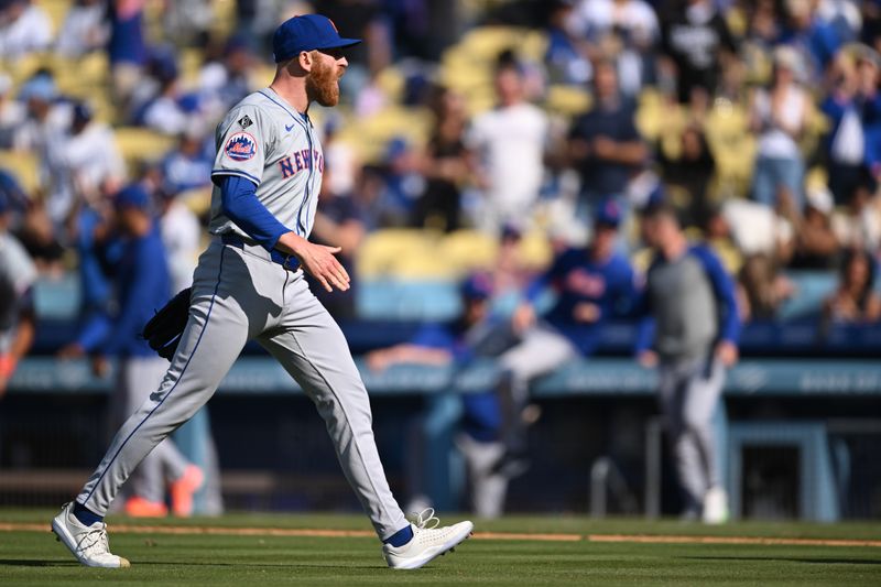 Apr 20, 2024; Los Angeles, California, USA; New York Mets pitcher Reed Garrett (75) reacts after defeating the Los Angeles Dodgers during the ninth inning at Dodger Stadium. Mandatory Credit: Jonathan Hui-USA TODAY Sports