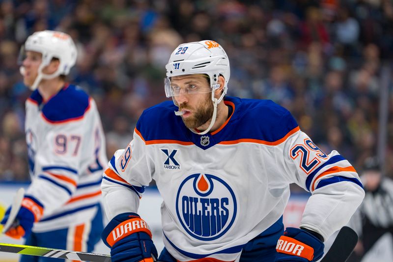 Nov 9, 2024; Vancouver, British Columbia, CAN; Edmonton Oilers forward Leon Draisaitl (29) prepares for a face off against the Vancouver Canucks during the first period at Rogers Arena. Mandatory Credit: Bob Frid-Imagn Images