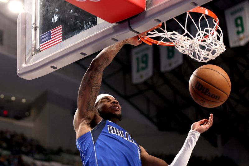 DALLAS, TEXAS - JANUARY 05: Jaden Hardy #1 of the Dallas Mavericks dunks the ball in the second half against the Portland Trail Blazers at American Airlines Center on January 05, 2024 in Dallas, Texas. NOTE TO USER: User expressly acknowledges and agrees that, by downloading and or using this photograph, User is consenting to the terms and conditions of the Getty Images License Agreement. (Photo by Tim Heitman/Getty Images)