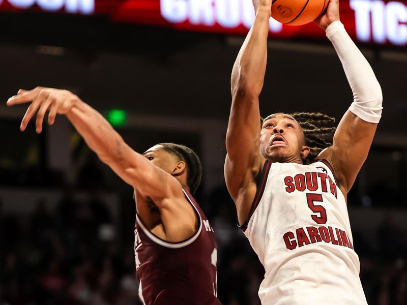 Jan 6, 2024; Columbia, South Carolina, USA; South Carolina Gamecocks guard Meechie Johnson (5) drives against the Mississippi State Bulldogs in the first half at Colonial Life Arena. Mandatory Credit: Jeff Blake-USA TODAY Sports