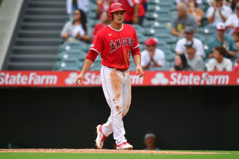 Aug 19, 2023; Anaheim, California, USA; Los Angeles Angels catcher Matt Thaiss (21) scores a run against the Tampa Bay Rays during the second inning at Angel Stadium. Mandatory Credit: Gary A. Vasquez-USA TODAY Sports