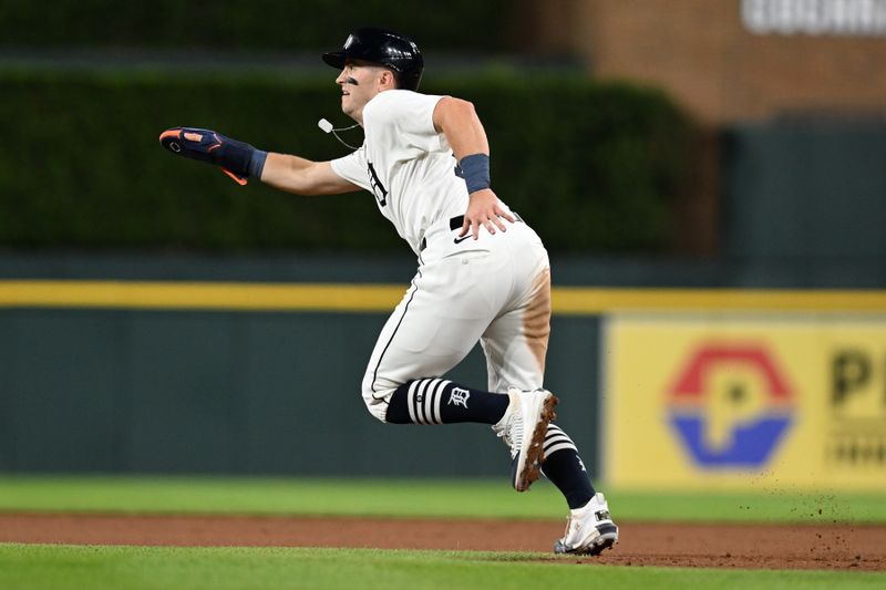 Sep 10, 2024; Detroit, Michigan, USA; Detroit Tigers third baseman Jace Jung (17) takes off for second base against the Colorado Rockies  in the sixth inning at Comerica Park. Mandatory Credit: Lon Horwedel-Imagn Images