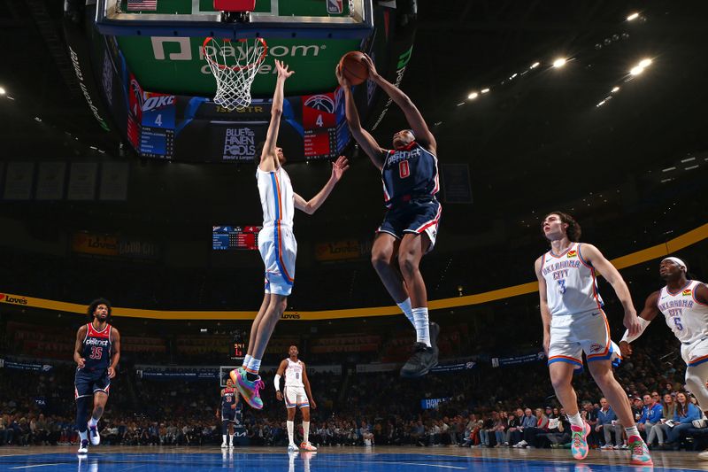 OKLAHOMA CITY, OK - FEBRUARY 23: Bilal Coulibaly #0 of the Washington Wizards drives to the basket during the game against the Oklahoma City Thunder on February 23, 2024 at Paycom Arena in Oklahoma City, Oklahoma. NOTE TO USER: User expressly acknowledges and agrees that, by downloading and or using this photograph, User is consenting to the terms and conditions of the Getty Images License Agreement. Mandatory Copyright Notice: Copyright 2024 NBAE (Photo by Zach Beeker/NBAE via Getty Images)