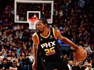 PHOENIX, AZ - NOVEMBER 15: Kevin Durant #35 of the Phoenix Suns dribbles the ball during the game against the Minnesota Timberwolves on November 15, 2023 at Footprint Center in Phoenix, Arizona. NOTE TO USER: User expressly acknowledges and agrees that, by downloading and or using this photograph, user is consenting to the terms and conditions of the Getty Images License Agreement. Mandatory Copyright Notice: Copyright 2023 NBAE (Photo by Barry Gossage/NBAE via Getty Images)