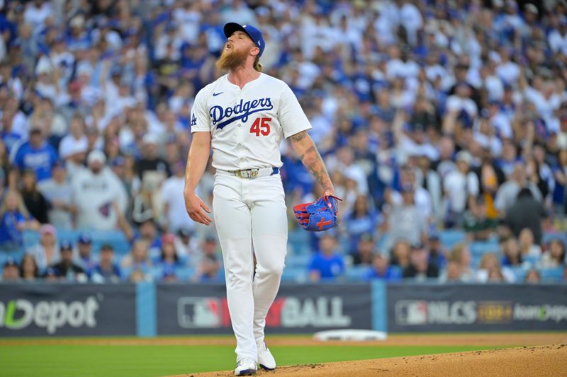 Oct 20, 2024; Los Angeles, California, USA; Los Angeles Dodgers pitcher Michael Kopech (45) reacts in the first inning against the New York Mets during game six of the NLCS for the 2024 MLB playoffs at Dodger Stadium. Mandatory Credit: Jayne Kamin-Oncea-Imagn Images