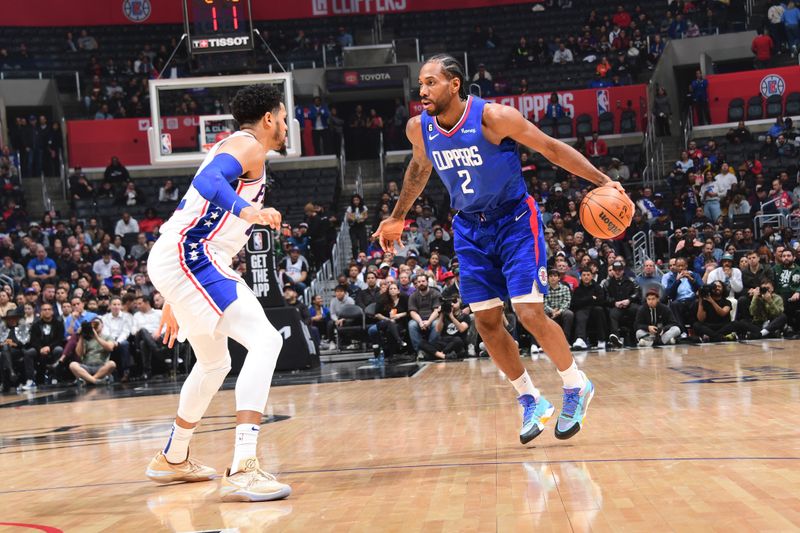 LOS ANGELES, CA - JANUARY 17: Kawhi Leonard #2 of the LA Clippers dribbles the ball during the game against the Philadelphia 76ers on January 17, 2023 at Crypto.Com Arena in Los Angeles, California. NOTE TO USER: User expressly acknowledges and agrees that, by downloading and/or using this Photograph, user is consenting to the terms and conditions of the Getty Images License Agreement. Mandatory Copyright Notice: Copyright 2023 NBAE (Photo by Adam Pantozzi/NBAE via Getty Images)