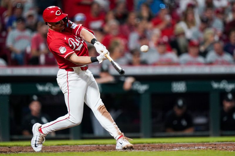 May 14, 2025; Cincinnati, Ohio, USA; Cincinnati Reds first baseman Spencer Steer (7) hits a homer in the seventh inning of the MLB interleague game between the Cincinnati Reds and Chicago White Sox. Mandatory Credit: Frank Bowen IV-Imagn Images