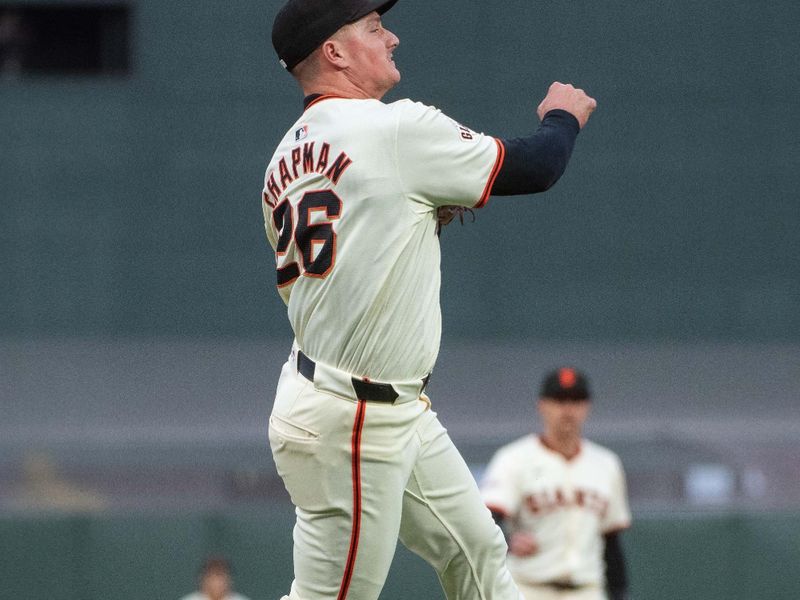 Apr 23, 2024; San Francisco, California, USA;  San Francisco Giants third base Matt Chapman (26) throws the ball to first base against the New York Mets during the third inning at Oracle Park. Mandatory Credit: Ed Szczepanski-USA TODAY Sports