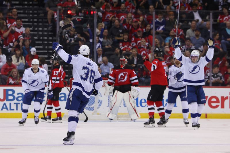 Oct 22, 2024; Newark, New Jersey, USA; Tampa Bay Lightning left wing Brandon Hagel (38) celebrates his goal against the New Jersey Devils during the second period at Prudential Center. Mandatory Credit: Ed Mulholland-Imagn Images