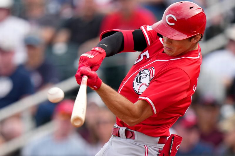 Feb. 24, 2024; Goodyear, Arizona, USA; Cincinnati Reds infielder Tyler Callihan hits a two-run home run in the eighth inning during a MLB spring training baseball game against the Cleveland Guardians at Goodyear Ballpark. Mandatory Credit: Kareem Elgazzar-USA TODAY Sports