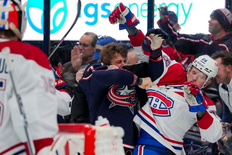 Nov 29, 2023; Columbus, Ohio, USA;  Columbus Blue Jackets center Sean Kuraly (7) scrums with Montreal Canadiens center Christian Dvorak (28) during a stop in play in the second period at Nationwide Arena. Mandatory Credit: Aaron Doster-USA TODAY Sports