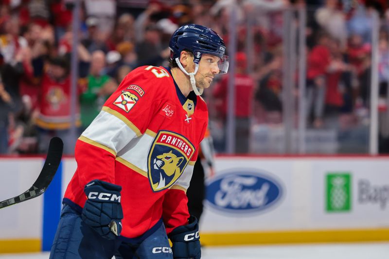 Dec 20, 2025; Sunrise, Florida, USA; Florida Panthers center Sam Reinhart (13) looks on after scoring against the St. Louis Blues during the second period at Amerant Bank Arena. Mandatory Credit: Sam Navarro-Imagn Images