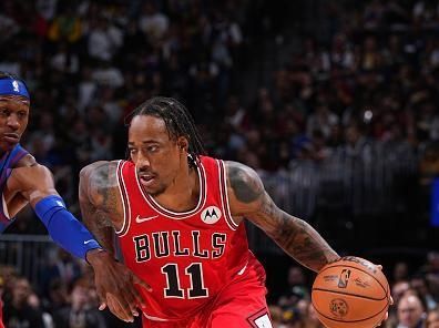 DENVER, CO - NOVEMBER 4: DeMar DeRozan #11 of the Chicago Bulls drives to the basket during the game against the Denver Nuggets on November 4, 2023 at the Ball Arena in Denver, Colorado. NOTE TO USER: User expressly acknowledges and agrees that, by downloading and/or using this Photograph, user is consenting to the terms and conditions of the Getty Images License Agreement. Mandatory Copyright Notice: Copyright 2023 NBAE (Photo by Garrett Ellwood/NBAE via Getty Images)