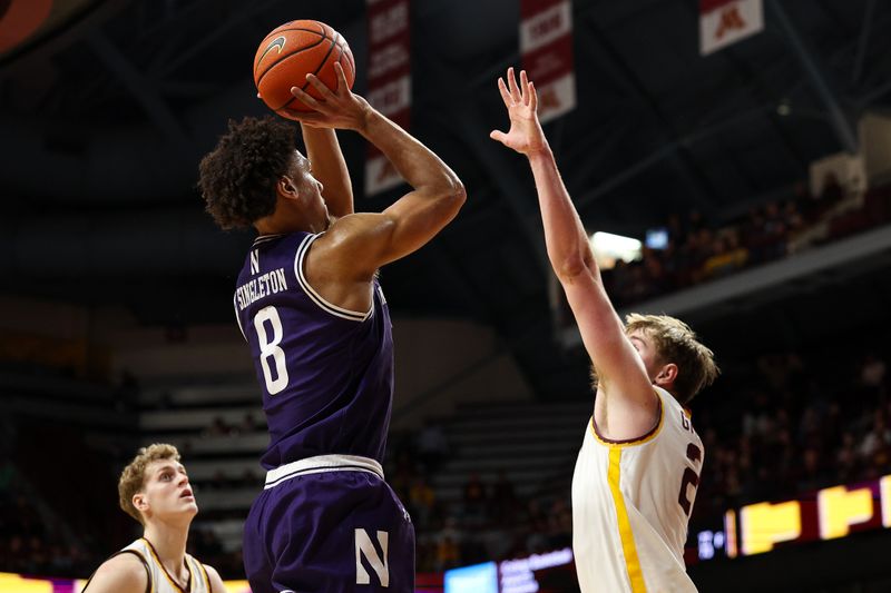 Mar 7, 2026; Minneapolis, Minnesota, USA; Northwestern Wildcats forward Tre Singleton (8) shoots over Minnesota Golden Gophers forward Grayson Grove (2) during the second half at Williams Arena. Mandatory Credit: Matt Krohn-Imagn Images