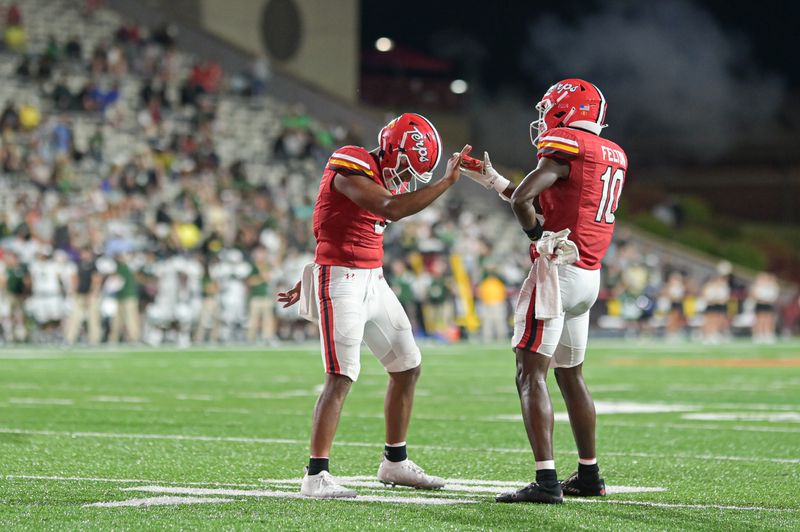 zSep 9, 2023; College Park, Maryland, USA; Maryland Terrapins quarterback Taulia Tagovailoa (3) celebrates with wide receiver Tai Felton (10) after throwing a touchdown during the second half against the Charlotte 49ers at SECU Stadium. Mandatory Credit: Tommy Gilligan-USA TODAY Sports