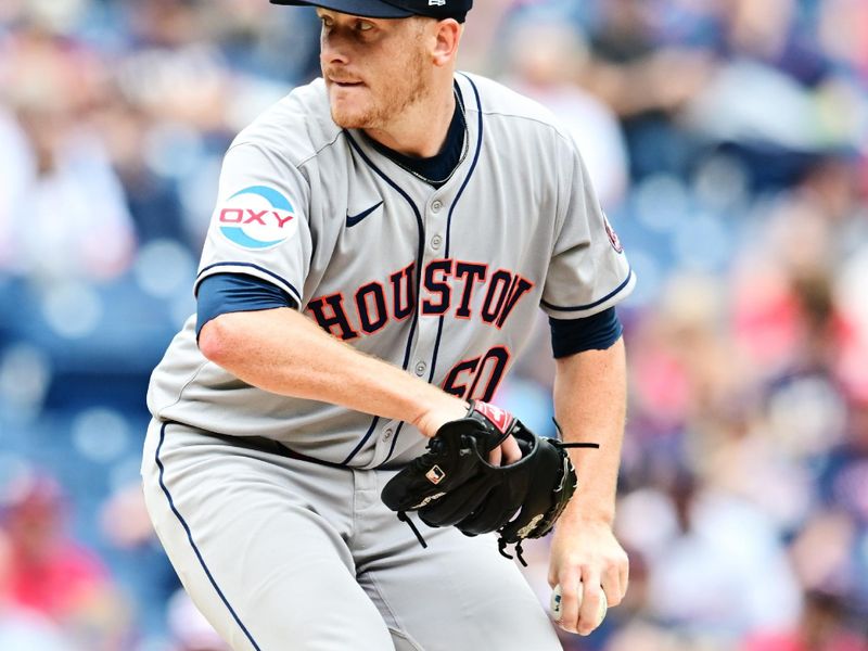 Jun 8, 2025; Cleveland, Ohio, USA; Houston Astros starting pitcher Brandon Walter (60) throws a pitch during the first inning against the Cleveland Guardians at Progressive Field. Mandatory Credit: Ken Blaze-Imagn Images