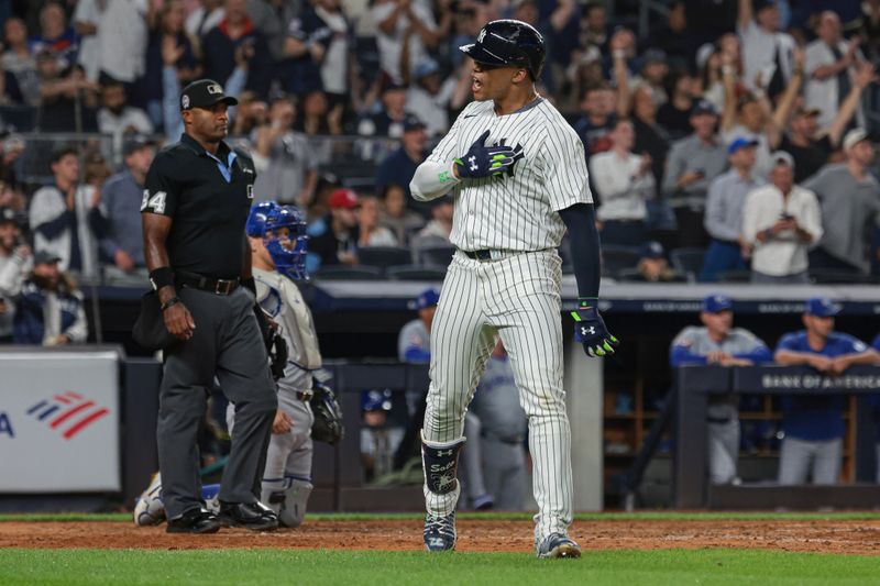 Sep 11, 2024; Bronx, New York, USA; New York Yankees right fielder Juan Soto (22) reacts after his two run home run during the sixth inning against the Kansas City Royals at Yankee Stadium. Mandatory Credit: Vincent Carchietta-Imagn Images