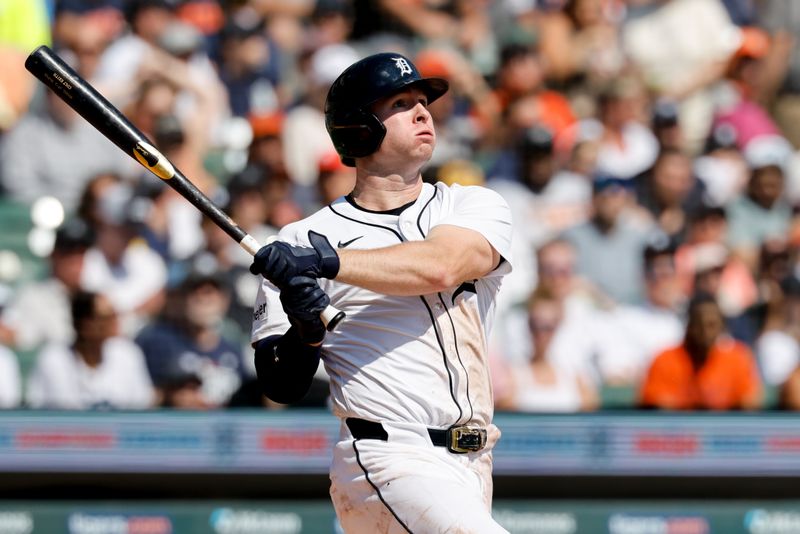 Sep 18, 2025; Detroit, Michigan, USA;  Detroit Tigers second base Colt Keith (33) hits an RBI double in the second inning against the Cleveland Guardians at Comerica Park. Mandatory Credit: Rick Osentoski-Imagn Images