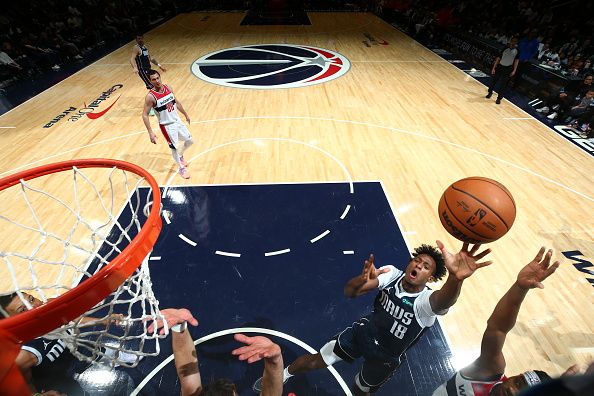 WASHINGTON, DC -? NOVEMBER 15: Olivier Maxence-Prosper #18 of the Dallas Mavericks shoots the ball during the game against the Washington Wizards on November 15, 2023 at Capital One Arena in Washington, DC. NOTE TO USER: User expressly acknowledges and agrees that, by downloading and or using this Photograph, user is consenting to the terms and conditions of the Getty Images License Agreement. Mandatory Copyright Notice: Copyright 2023 NBAE (Photo by Stephen Gosling/NBAE via Getty Images)