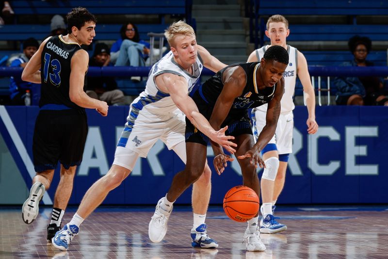 Mar 4, 2023; Colorado Springs, Colorado, USA; Air Force Falcons forward Rytis Petraitis (31) and San Jose State Spartans guard Omari Moore (10) battle for a loose ball in the second half at Clune Arena. Mandatory Credit: Isaiah J. Downing-USA TODAY Sports