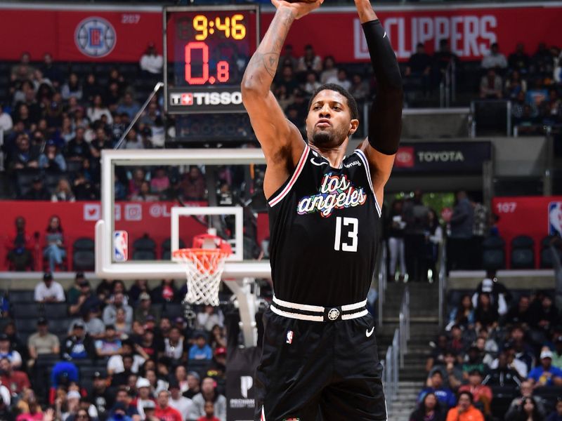 LOS ANGELES, CA - MARCH 18: Paul George #13 of the LA Clippers shoots a three point basket during the game against the Orlando Magic on March 18, 2023 at Crypto.Com Arena in Los Angeles, California. NOTE TO USER: User expressly acknowledges and agrees that, by downloading and/or using this Photograph, user is consenting to the terms and conditions of the Getty Images License Agreement. Mandatory Copyright Notice: Copyright 2023 NBAE (Photo by Adam Pantozzi/NBAE via Getty Images)