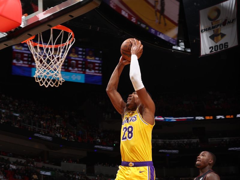 MIAMI, FL - DECEMBER 4: Rui Hachimura #28 of the Los Angeles Lakers dunks the ball during the game against the Miami Heat on December 4, 2024 at Kaseya Center in Miami, Florida. NOTE TO USER: User expressly acknowledges and agrees that, by downloading and or using this Photograph, user is consenting to the terms and conditions of the Getty Images License Agreement. Mandatory Copyright Notice: Copyright 2024 NBAE (Photo by Joe Murphy/NBAE via Getty Images)