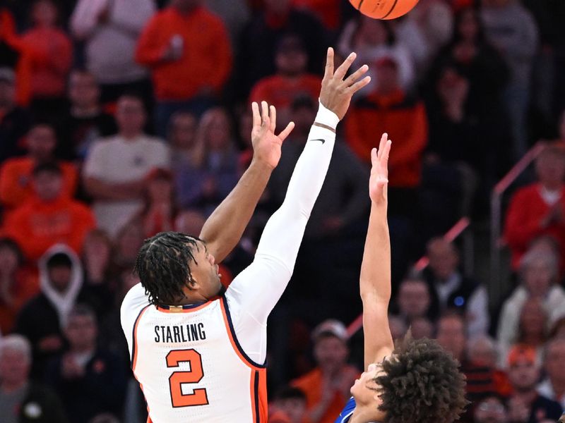 Dec 13, 2025; Syracuse, New York, USA; Syracuse Orange guard JJ Starling (2) shoots over Hofstra Pride guard Preston Edmead (1) in the first half at the JMA Wireless Dome. Mandatory Credit: Mark Konezny-Imagn Images