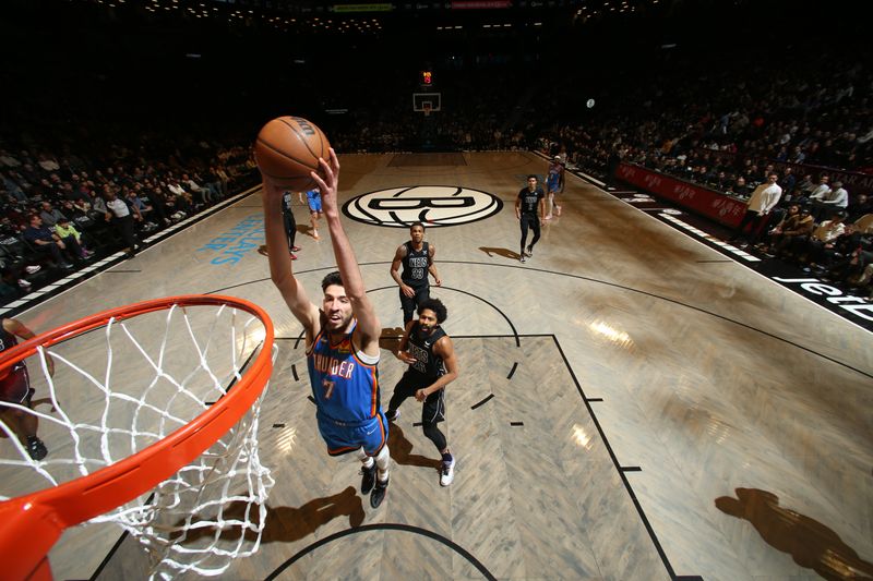 BROOKLYN, NY - JANUARY 5: Chet Holmgren #7 of the Oklahoma City Thunder goes to the basket during the game on January 5, 2024 at Barclays Center in Brooklyn, New York. NOTE TO USER: User expressly acknowledges and agrees that, by downloading and or using this Photograph, user is consenting to the terms and conditions of the Getty Images License Agreement. Mandatory Copyright Notice: Copyright 2024 NBAE (Photo by Nathaniel S. Butler/NBAE via Getty Images)