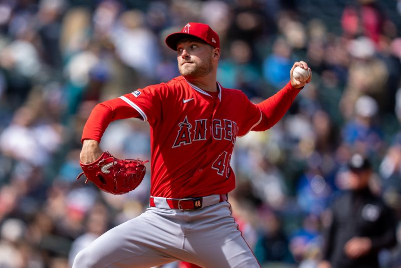 Apr 30, 2025; Seattle, Washington, USA;  Los Angeles Angels reliever Reid Detmers (48) delivers a pitch during the seventh inning against the Seattle Mariners at T-Mobile Park. Mandatory Credit: Stephen Brashear-Imagn Images