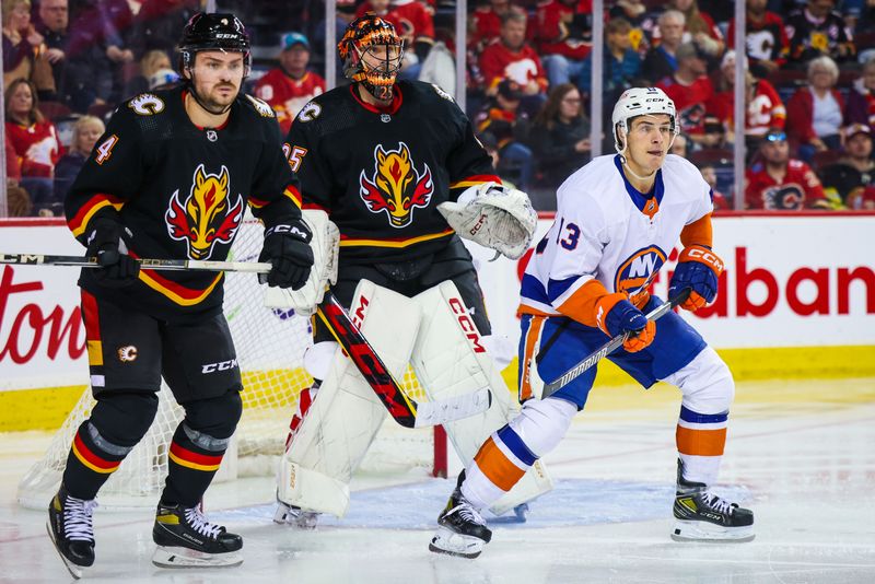 Nov 18, 2023; Calgary, Alberta, CAN; New York Islanders center Mathew Barzal (13) screens in front of Calgary Flames goaltender Jacob Markstrom (25) during the third period at Scotiabank Saddledome. Mandatory Credit: Sergei Belski-USA TODAY Sports